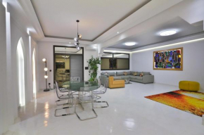 Appartement Nia Confort 2, en plein centre ville, alliant Tradition et Modernité